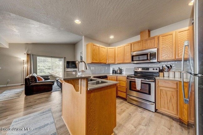 Building Photo - Beautiful Updated 3 Bedroom Condo with A/C, Garage & Fireplace in Forsythia Place!