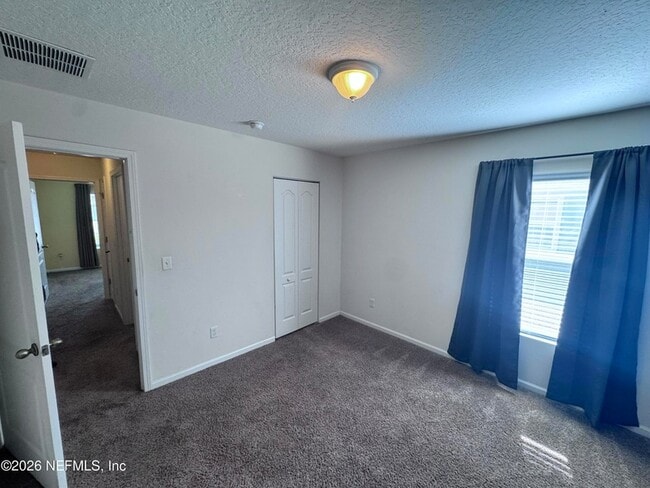 Building Photo - 15373 Bareback Dr