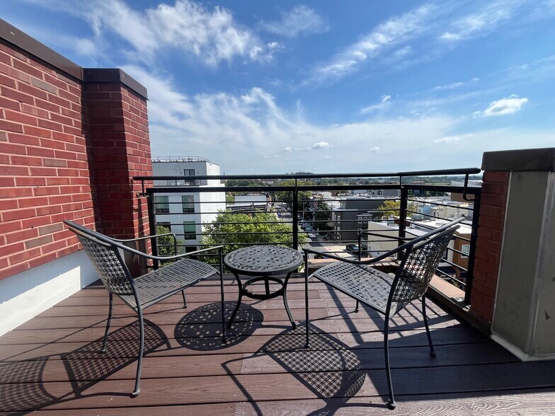 Look out over the reservoir with your morning coffee. - 2910 Georgia Ave NW