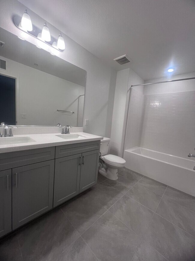 Building Photo - BRAND NEW TOWNHOUSE