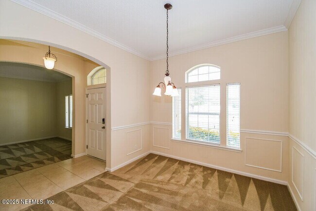 Building Photo - 7068 Rapid River Dr W