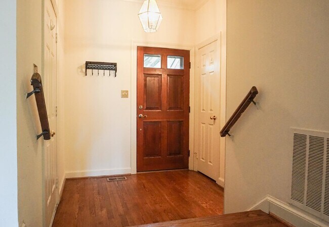 Building Photo - Beautiful brick townhome featuring three f...