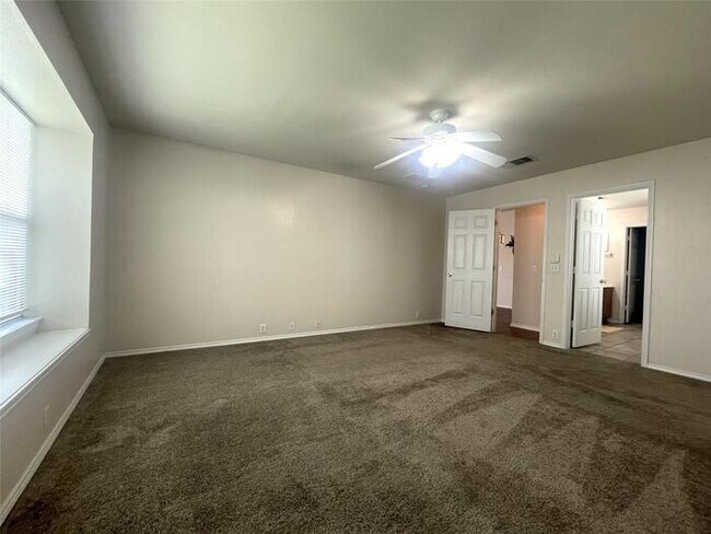 Building Photo - Plank Floors & Modern Comforts!" "Corner Fireplace, Split Bedrooms & a Master Retreat You’ll Love!"