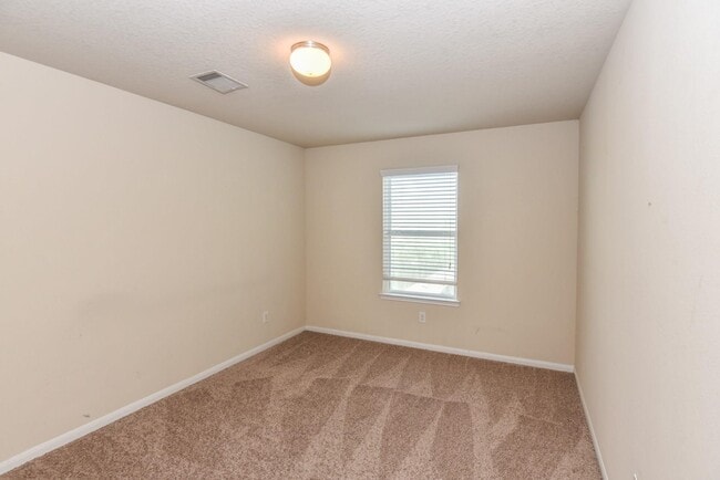 Building Photo - 5827 Annatto Dr