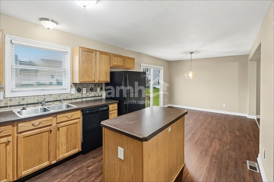 Building Photo - 8502 Flowering Cherry Dr