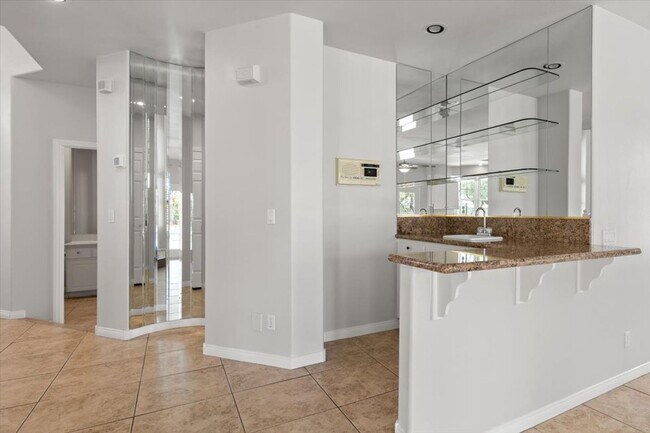 Building Photo - Expansive 4 Bedroom Home with a Pool and L...