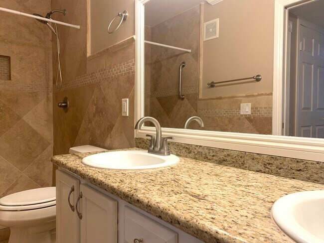 Building Photo - Thrive in this upgraded first-floor two be...