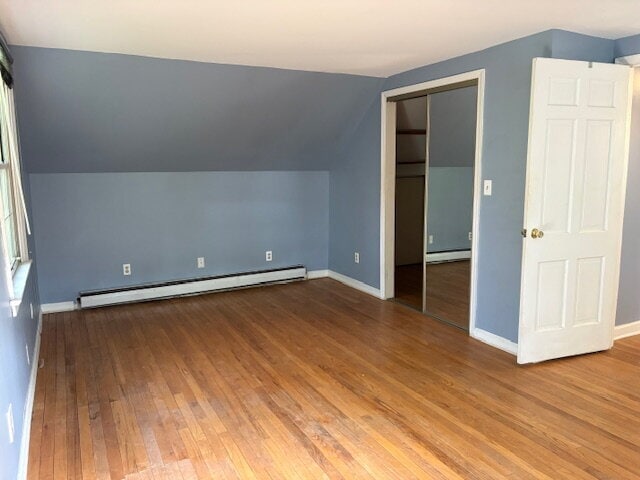 Building Photo - Hardwood floors and beautiful back yard in...