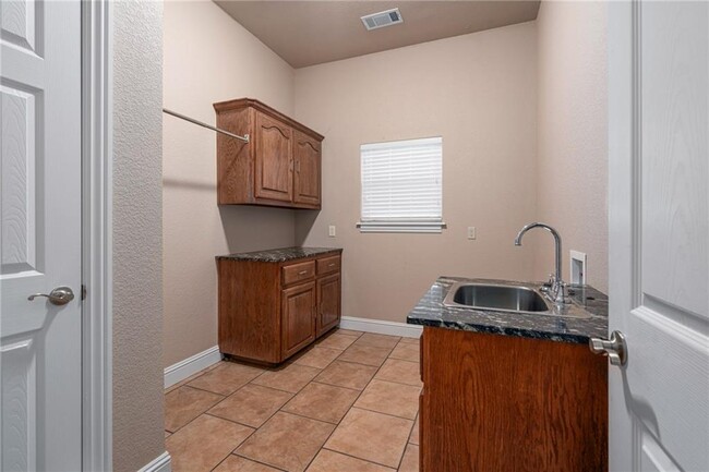 Building Photo - 6500 Riley Park Dr