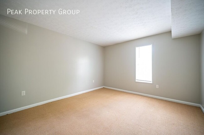 Building Photo - Available in May! Located on a quiet stree...