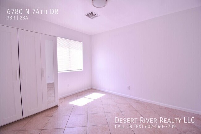 Building Photo - 6780 N 74th Dr