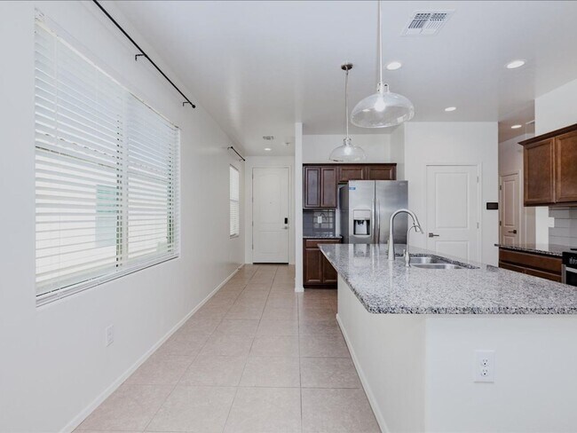 Building Photo - 3 Bedroom 2 Bathroom With Den      SOLAR PANELS! BRAND NEW FULL INTERIOR PAINT!! BRAND NEW EPOXY ...
