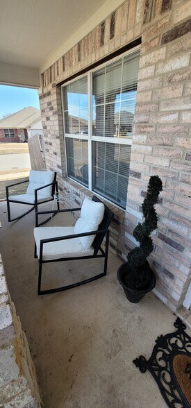 Private sitting area on front - 900 Yi Dr