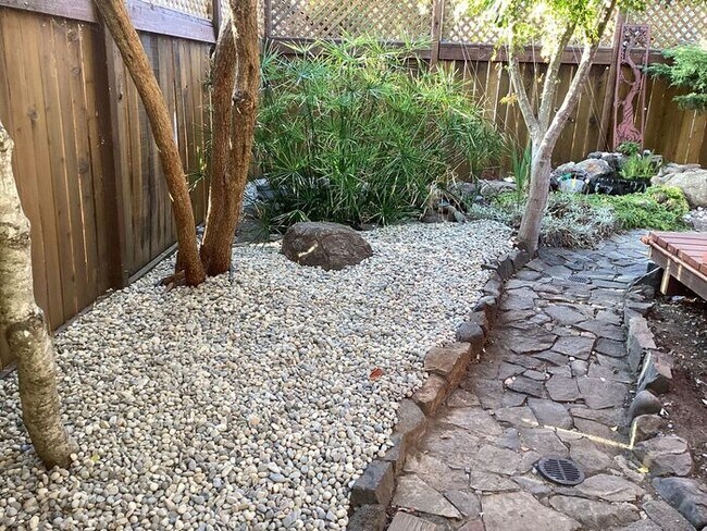 Building Photo - Look No Further, this home has it all- Hot Tub, Sauna, EV Charger, Solar, KOI Pond & More