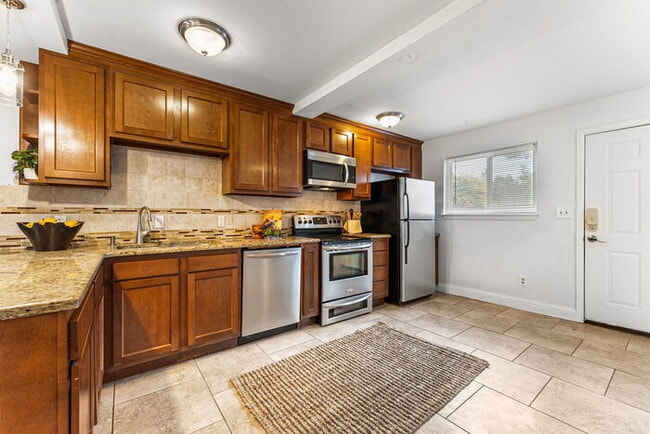 Building Photo - Beautiful Open Concept Brick Ranch blocks ...
