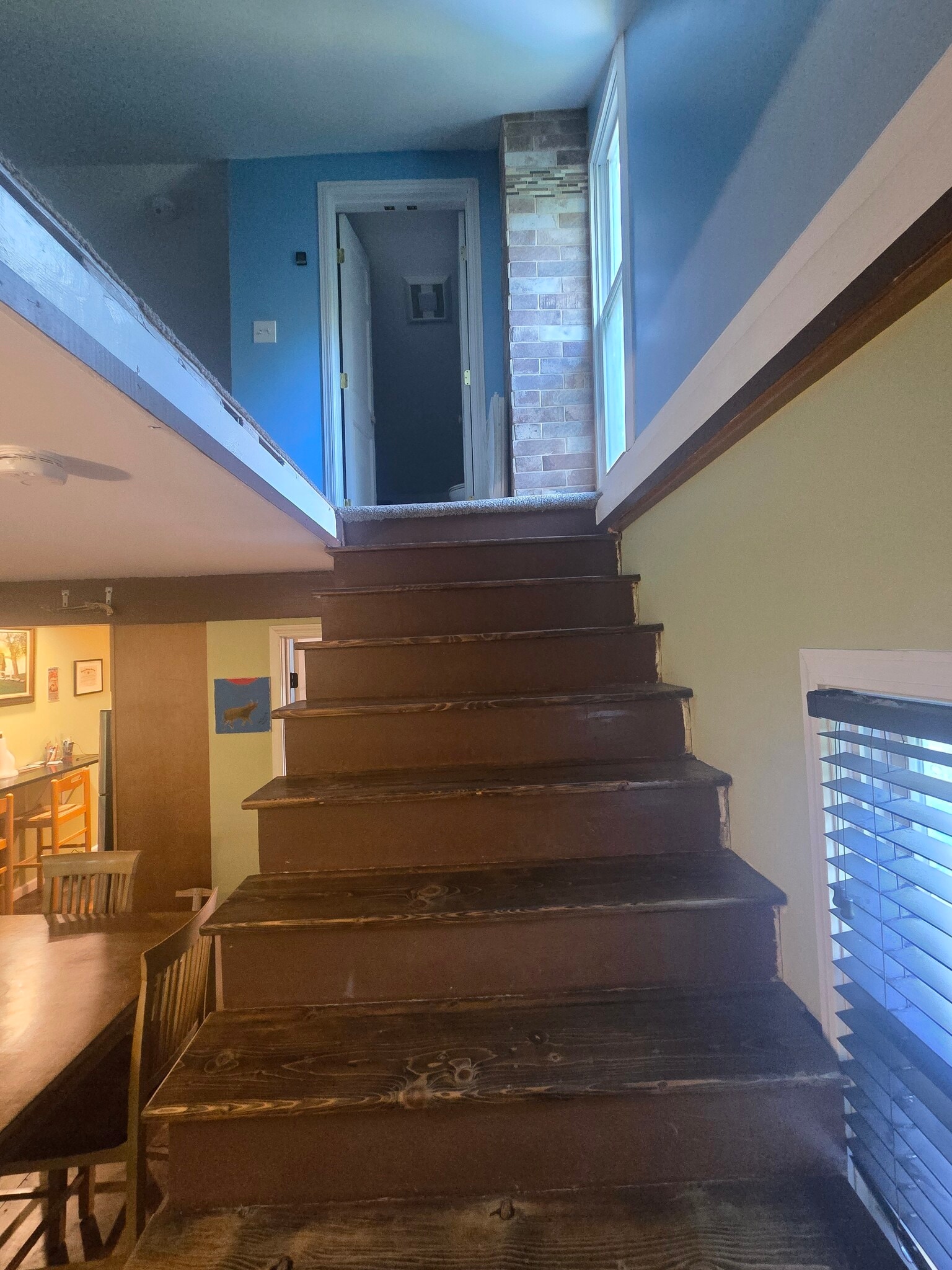 stairs up to loft bedroom and half bath - 5408 Main St