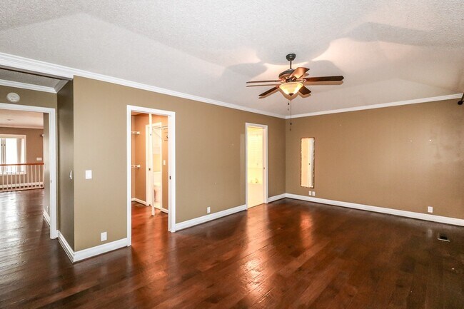 Building Photo - Beautiful 4 Bedroom, 3 Bath home. It has a 2 car garage plus a 1 car carport.  Stay warm in the w...