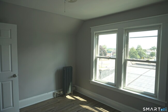 Building Photo - 3371-3373-3373 Main St