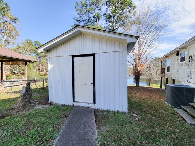 Building Photo - Escape to your updated 3-bed, 2-bath oasis in Goodrich, TX, featuring modern finishes, an open la...