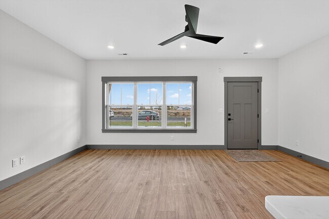 Building Photo - BRAND NEW3 BED 2.5 BATH TOWNHOME WITH 2 STALL GARAGE