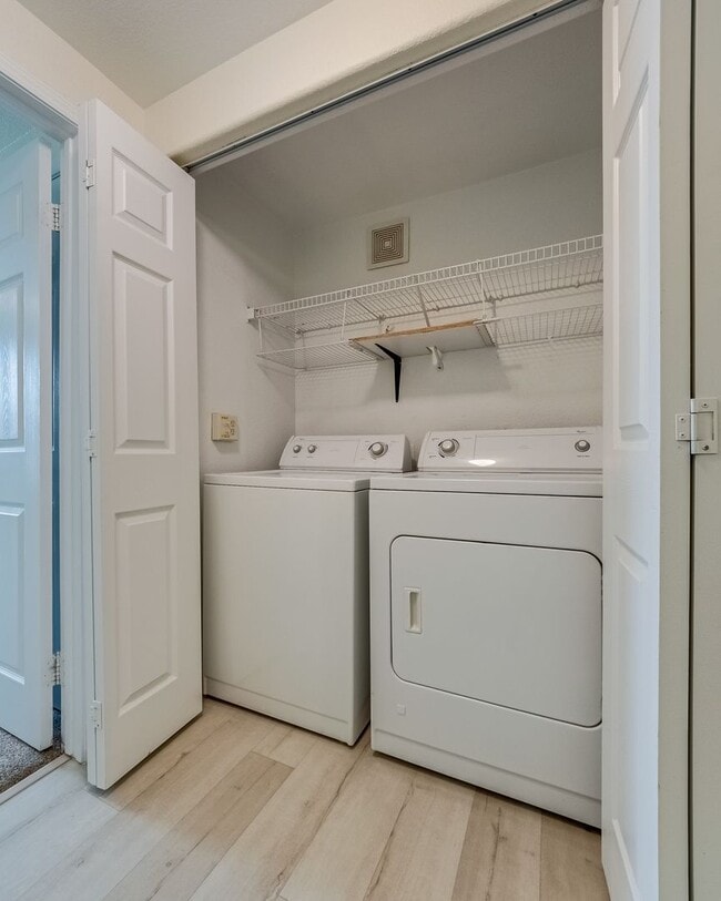 Building Photo - Move-In Ready Condo with Private Balcony & Modern Upgrades