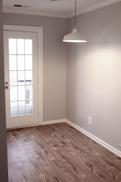 Step back in from balcony into dining area. - 2841 S Wakefield St