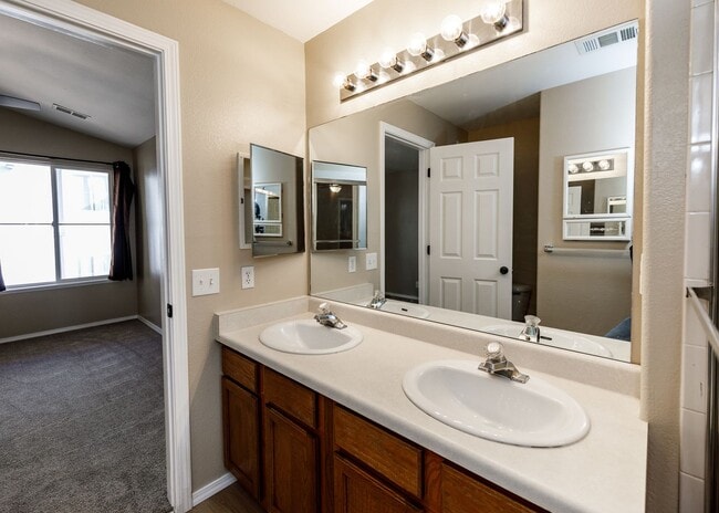 Building Photo - 3 Bed Top Floor Condo near Ft. Carson in Gated Community with detached Garage