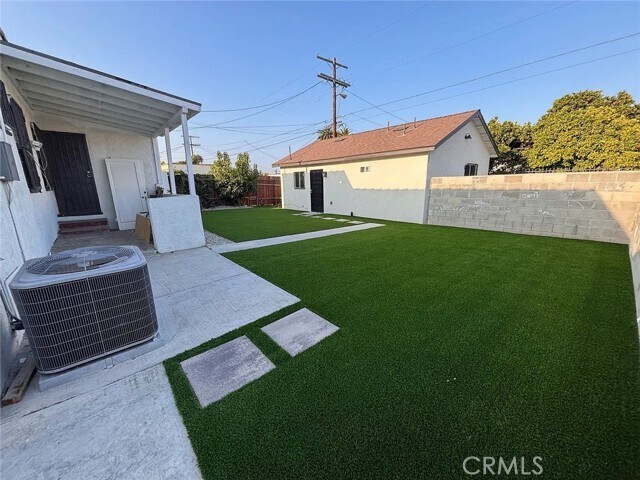 Building Photo - 7530 S Hobart Blvd