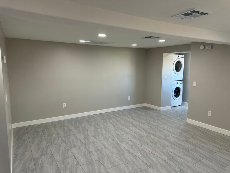 Open floorplan with recessed lighting throughout - 1331 W Speedway Blvd