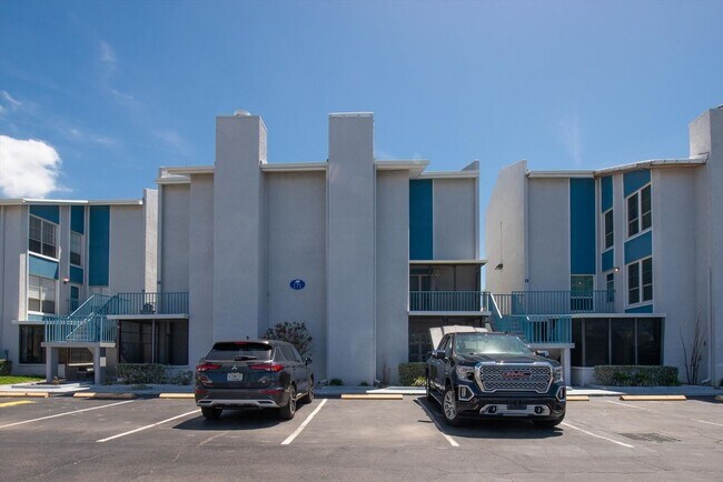 Building Photo - Gated Waterfront Community  1-Bedroom 1.5 ...