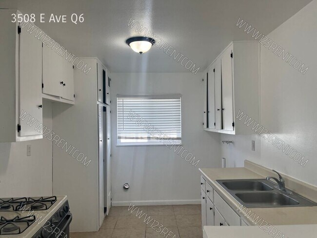 Building Photo - 3508 E Ave Q6