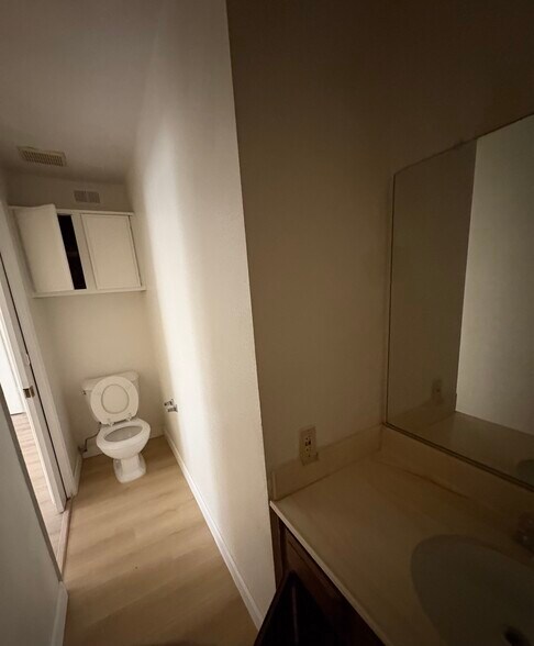 Private half bathroom within Bedroom #2 - 18410 Desidia St