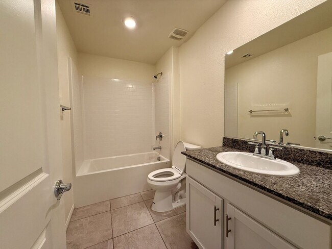 Building Photo - NEWLY UPGRADED 3 BED 2.5 BATH 2 CAR GARAGE...