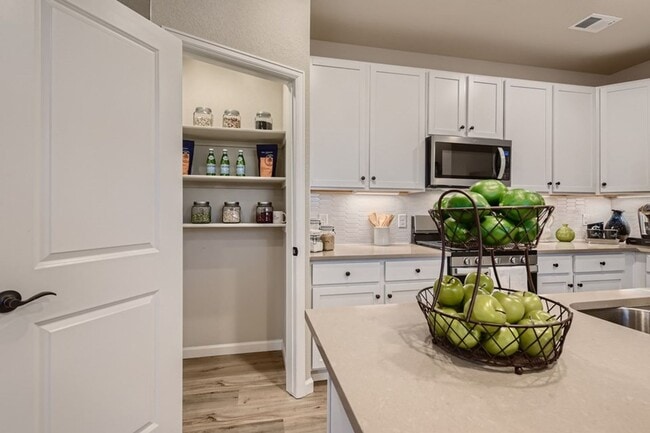 Building Photo - Embrace urban living in Highlands Ranch, CO with a new home at Verona.