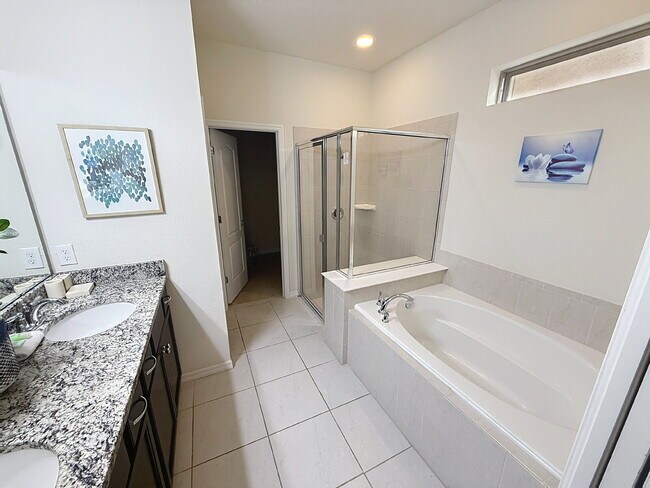 Building Photo - Welcome home to the fully furnished 5-bedroom, 5.5-bathroom private pool home located in Windsor ...