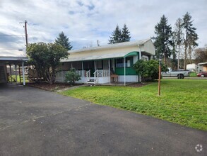 Building Photo - Charming home with RV parking, shop/laundr...