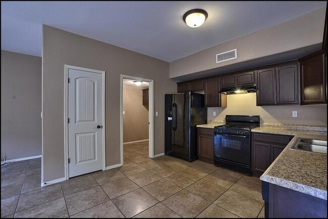 Building Photo - 14302 Pancho Gonzalez Ct