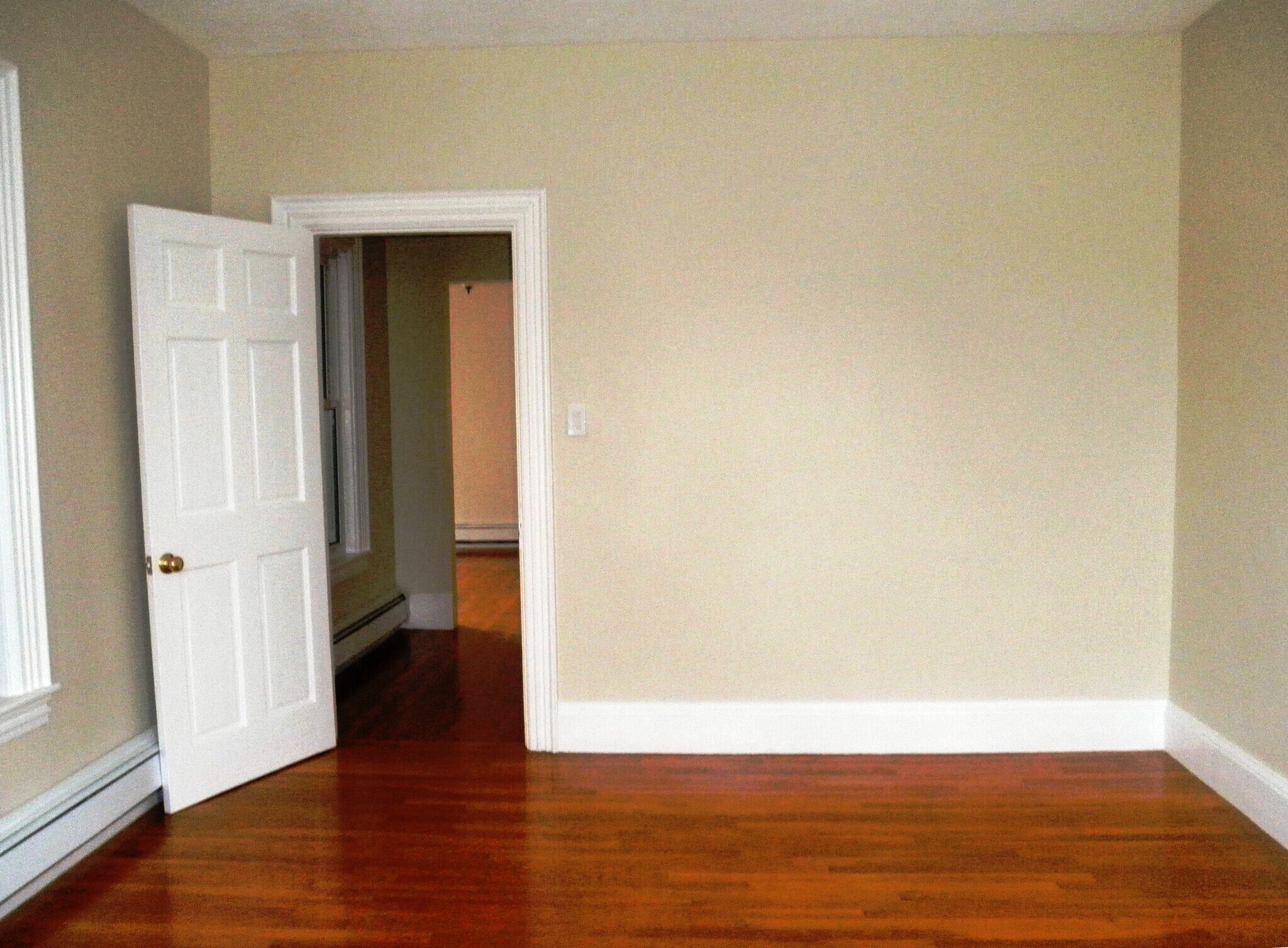 Living room opening into open office area - 129 Brown St