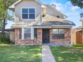 Building Photo - Spacious 3-Bedroom Home with Versatile Con...