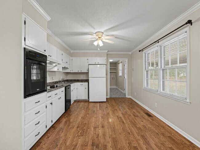 Building Photo - Charming 4-bedroom, 2-bath ranch-style home situated on just over 2 acres!