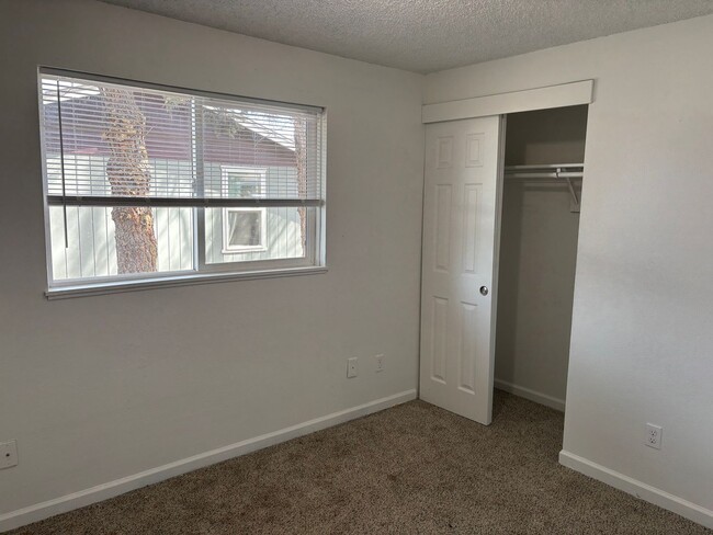 Building Photo - Three-Bedroom home with large backyard