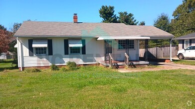 Building Photo - Recently Renovated: Charming Family Reside...