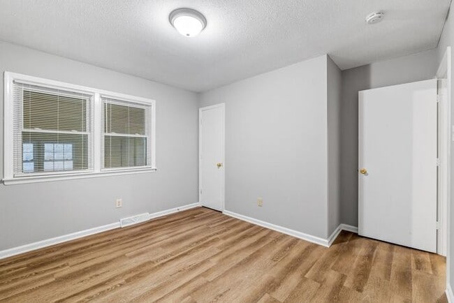 Building Photo - McLeansville - Minutes from Elon & Greensboro! Few Acres, Brick Duplex, Just Painted, New Carpet,...