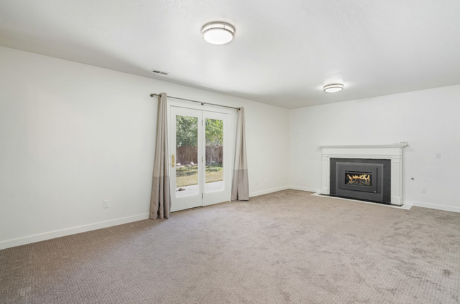 Building Photo - Modern 5 Bedroom Home with 3Car Garage in ...