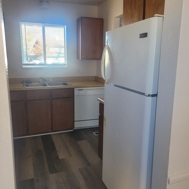 Building Photo - 2 Bed, 1 Bath Condo W/Detached 1 Car Garage & Fenced Yard!!!