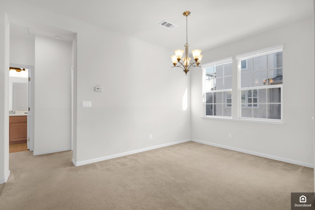 Building Photo - 584 De Guigne Dr