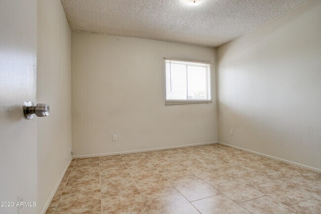 Building Photo - 7850 E Glenrosa Ave