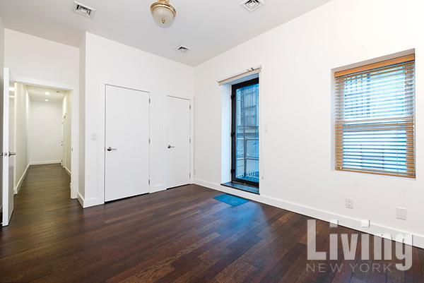 Building Photo - East Village 3 Bdr/2 Bath Duplex with Private Garden & Condo Finishes!