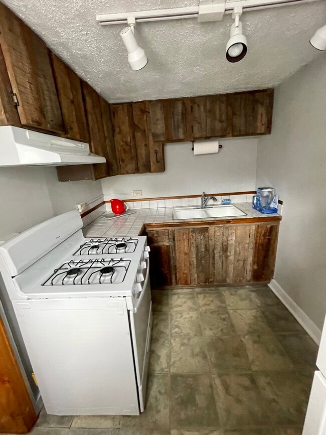 Barn Wood cabinet Kitchen - 2079 S Pearl St