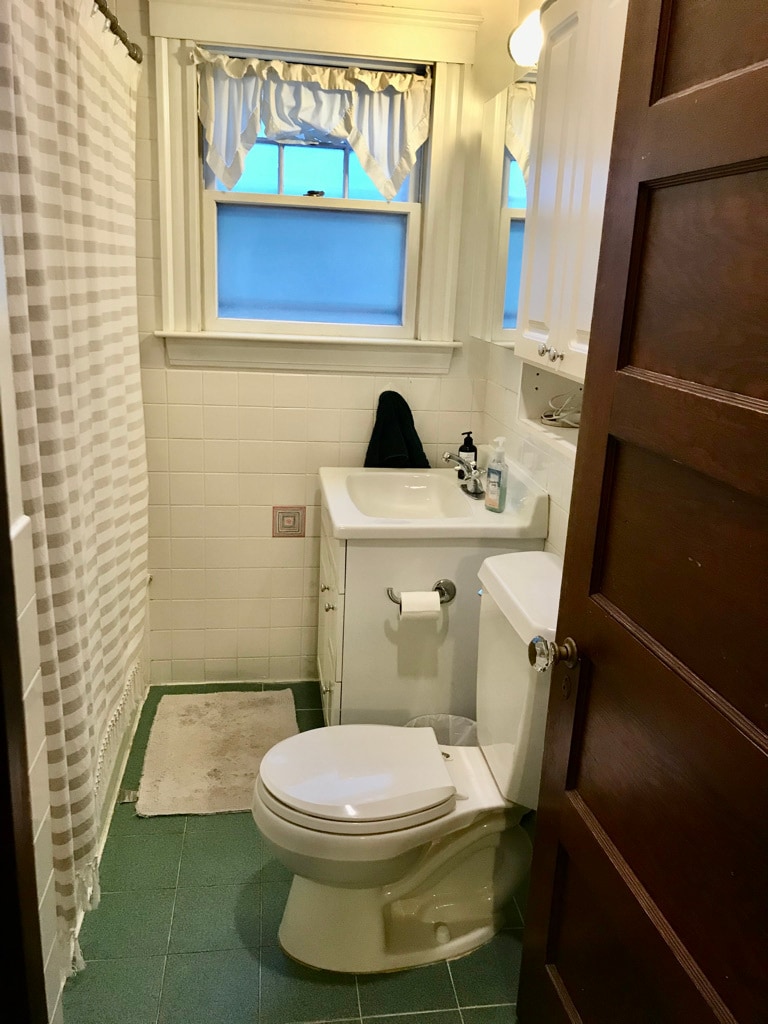 Bathroom - medicine cabinet,wall cabinet, lots of towel bars and hooks, tub with shower and sprayer - 37 Gorham Ave